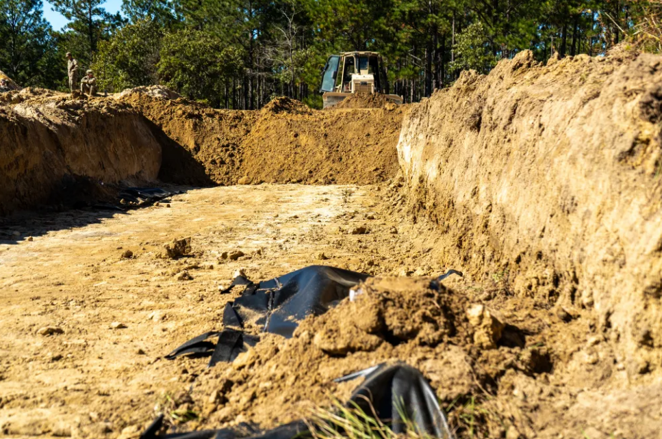 ARMY Training For DIGGING MASS GRAVES!?
